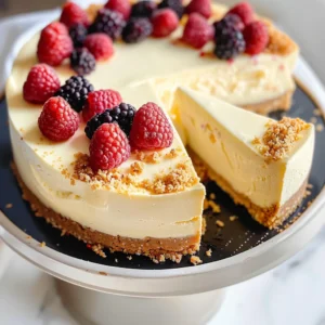 A classic baked cheesecake sliced into six generous portions, displayed on a white cake stand.